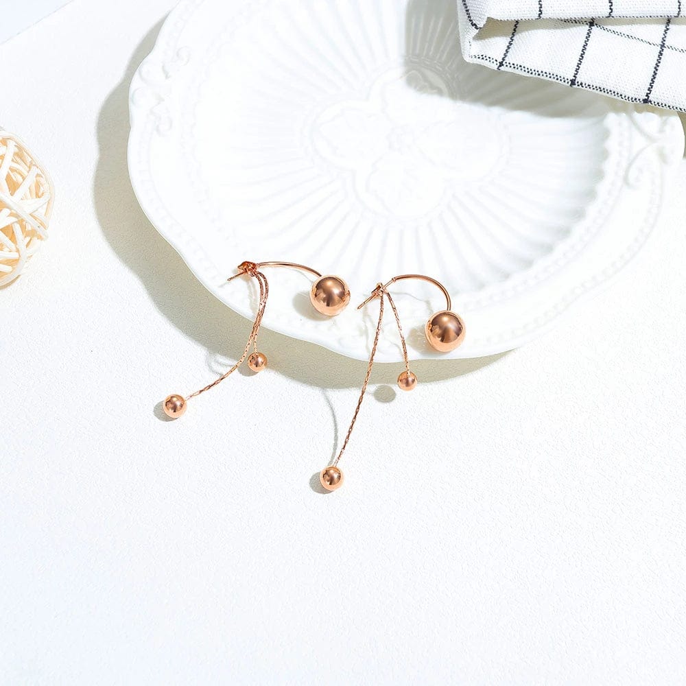 Boucle d&#39;Oreille pendante boule rose