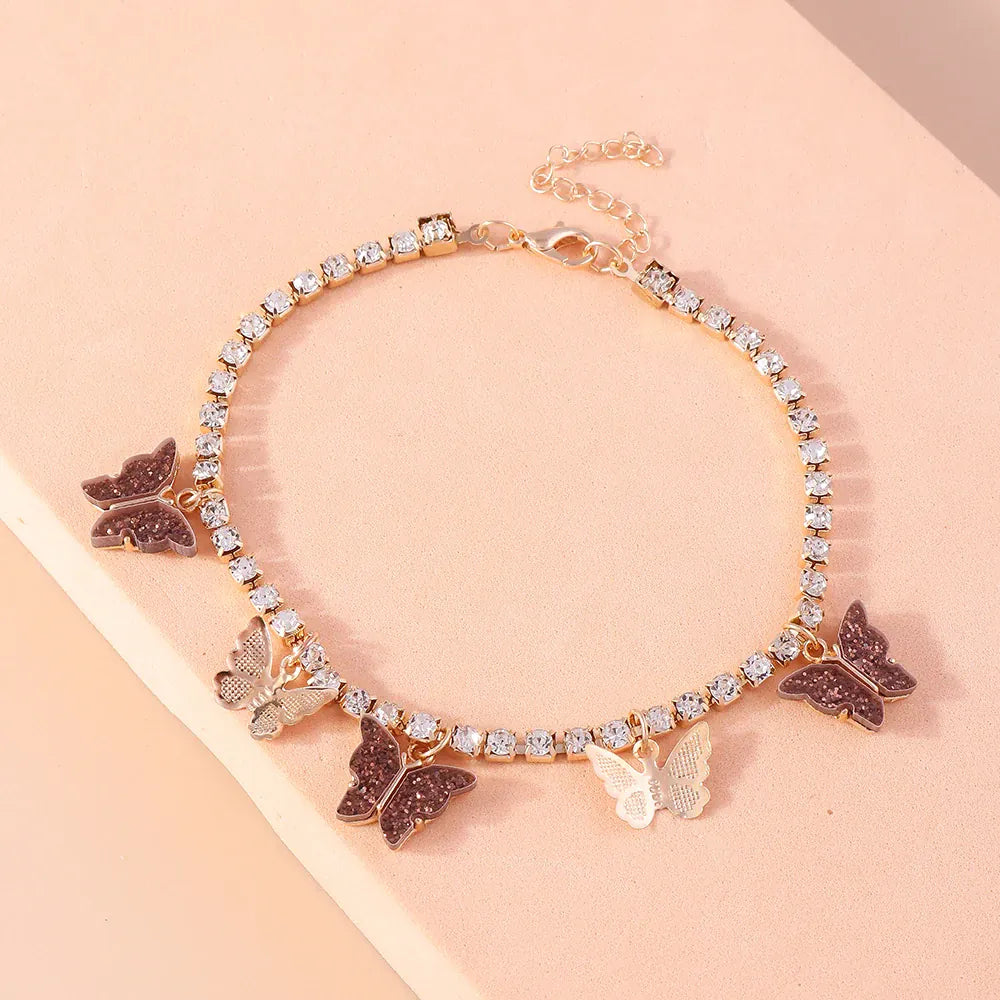 Chaine de Cheville Papillon Dorée