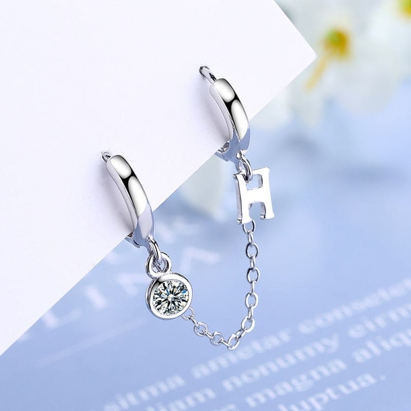 Boucle d&#39;oreille chaine 2 trous argentée