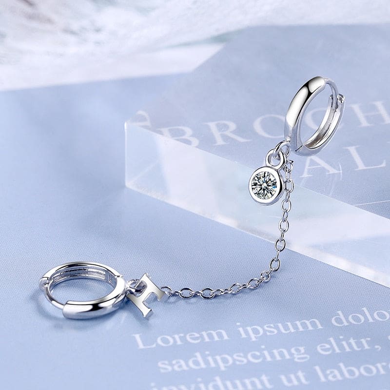 Boucle d&#39;oreille chaine 2 trous argentée