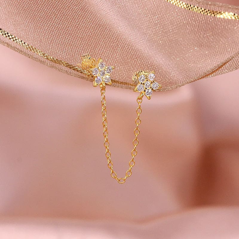 Boucle d&#39;oreille chaine 2 trous étoiles