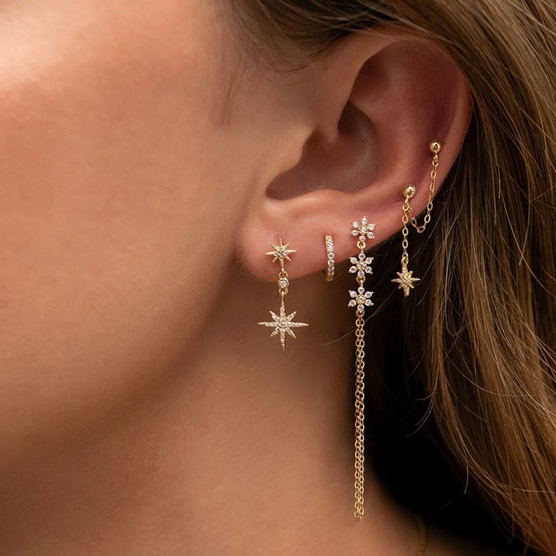 Boucle d'oreille chaine 2 trous pendante avec étoiles