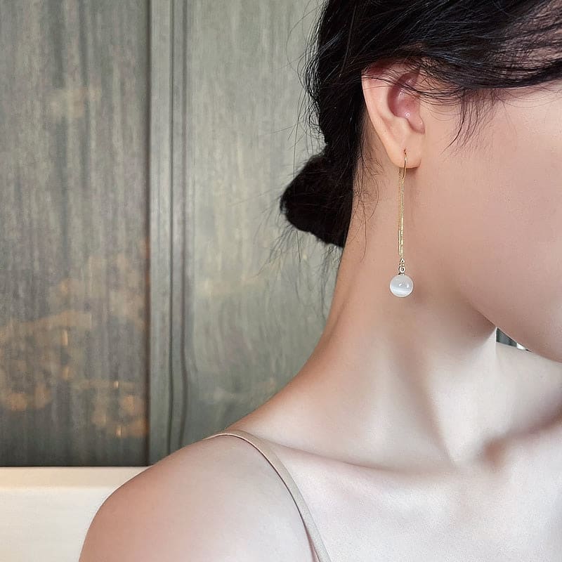 Boucle d'oreille chaine traversante avec perle