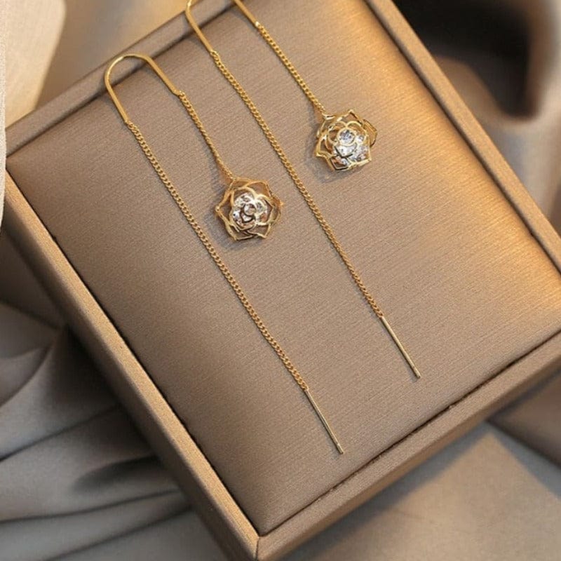 Boucle d&#39;oreille chaine traversante avec rose