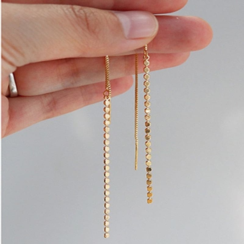 Boucle d&#39;oreille chaine traversante longue