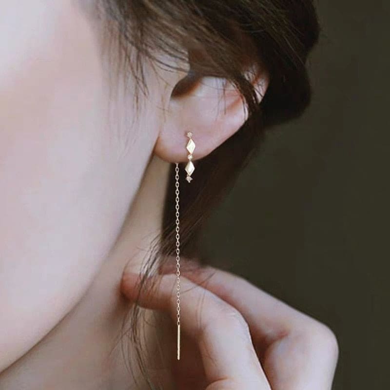Boucle d&#39;oreille chaine traversante losange doré