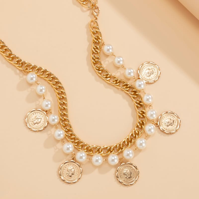 Chaine de taille avec perle et pièce