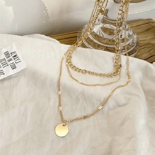 Collier triple chaine plaqué or